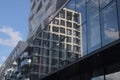 Modern architecture street in paris batignolles france mirror reflections of the building glass facade