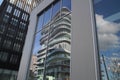 Modern architecture street in paris batignolles france mirror reflections of the building glass facade