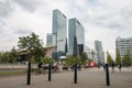 modern architecture of Rotterdam office buildings, modern city high rise, tall towers and roof central station in foreground Royalty Free Stock Photo