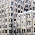 Modern architecture. Structural glazing of skyscraper exterior. Office tower building fragment with windows Royalty Free Stock Photo