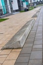 Modern architecture. unusual version of the curb on the sidewalk. Royalty Free Stock Photo