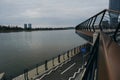 A modern area Waterfront of the city near the embankment of the Sava River. View from the ground in a snowless gray Royalty Free Stock Photo