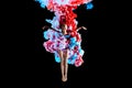 Modern art collage. Concept ballerina`s legs with colorful smoke.
