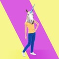 Modern art collage. Woman with unicorn`s head on color background Royalty Free Stock Photo