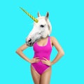 Modern art collage. Woman with unicorn`s head on turquoise background Royalty Free Stock Photo