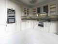 Modern art deco kitchen with classic elements. Glass facade and built-in appliances. Interior in beige colors