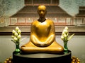 Modern Art of Golden Buddha Statue Sitting