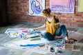 Modern art school female artist painting artworks