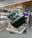 Modern art sculpture featuring a cube at Hamad International Airport Doha, Qatar