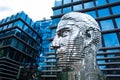 Modern art sculptures. Monument head of the Czech writer Franz Kafka in chrome. Interesting art object in Prague