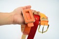 Modern artificial leather belts in the hand