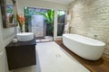 Modern Asian bathroom with timber deck.
