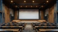 Modern Auditorium Interior with Spacious Seating and Blank Screen Royalty Free Stock Photo