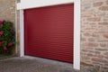 Modern automatic car garage roller door red closed metal gate Royalty Free Stock Photo