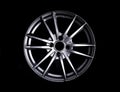 Modern automotive alloy wheel made of aluminum on a black background, industry. Designer fashion wheels for car Royalty Free Stock Photo