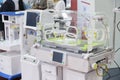 Modern Baby Incubator . Empty infant incubator in an hospital room. Nursery incubator in hospital. Box for carrying