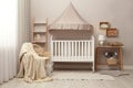 Modern baby room interior with crib Royalty Free Stock Photo