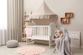 Modern baby room interior with crib Royalty Free Stock Photo