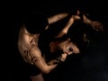 Modern ballet dancer couple in black form performing art dance element with empty copy space background, izolated