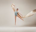 Modern ballet dancer dancing in full body on white studio background. Royalty Free Stock Photo