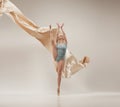 Modern ballet dancer dancing in full body on white studio background. Royalty Free Stock Photo