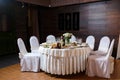 Modern banquet hall. Decorated tables, elegant setting, beautiful interior Royalty Free Stock Photo