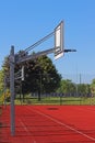 Modern basketball court in the courtyard of primary school. Multifunctional children`s playground with artificial surfaced fenced Royalty Free Stock Photo