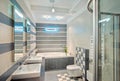 Modern bathroom in blue and gray tones with mosaic Royalty Free Stock Photo