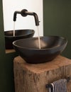 Modern bathroom bowl sink, black, watertap in the mirror Royalty Free Stock Photo