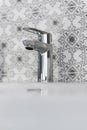 Modern bathroom chrome faucet Royalty Free Stock Photo