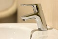 Modern bathroom chrome faucet Royalty Free Stock Photo