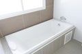 Modern bathroom with white bathtub. Royalty Free Stock Photo