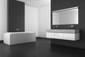 Modern bathroom with gray tiles and dark floor Royalty Free Stock Photo