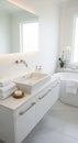 Modern bathroom features a sleek white design with a rectangular countertop sink Royalty Free Stock Photo