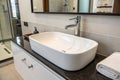 White ceramic basin in modern bathroom Royalty Free Stock Photo