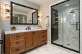 Modern bathroom with wood cabinet and black light Royalty Free Stock Photo
