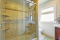 Modern bathroom with glass door shower Royalty Free Stock Photo