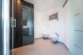 Modern bathroom with glass doors