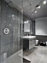 Modern bathroom with glass shower cubicle Royalty Free Stock Photo