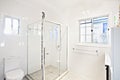 Modern bathroom with glass shower cubicle Royalty Free Stock Photo