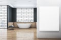 Modern bathroom interior with blank mock up banner on wall, bathtub, abstract windows and reflections on wooden flooring. 3D Royalty Free Stock Photo