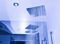 Modern bathroom interior with ceiling shower Royalty Free Stock Photo