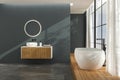 Modern bathroom interior with concrete flooring, Royalty Free Stock Photo