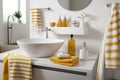 Modern bathroom interior, pile of clean towels and toiletries, white walls, sunny day Royalty Free Stock Photo