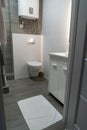 Modern bathroom interior of tiny studio appartment Royalty Free Stock Photo