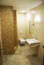 Modern bathroom with marble floor. Royalty Free Stock Photo