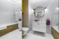 Modern bathroom with oval mirror