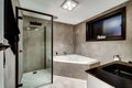 Modern bathroom renovation and makeover with jacuzzi, and shower, for a home interior design Royalty Free Stock Photo