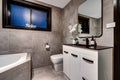 Modern bathroom renovation and makeover with toilet, jacuzzi and sink, for a home interior design Royalty Free Stock Photo