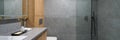 Modern bathroom with shower and gray tiles, panorama Royalty Free Stock Photo